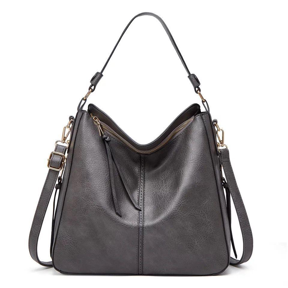 Classic leather shoulder bag with sleek gold details