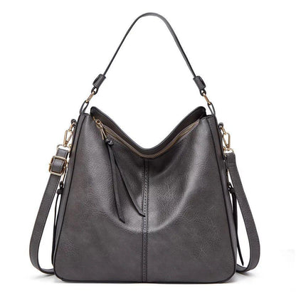 Classic leather shoulder bag with sleek gold details