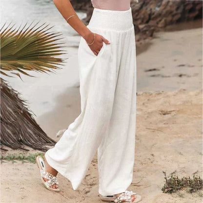 Pantaloni de damă din in, cu talie elastică încrețită și croială largă
