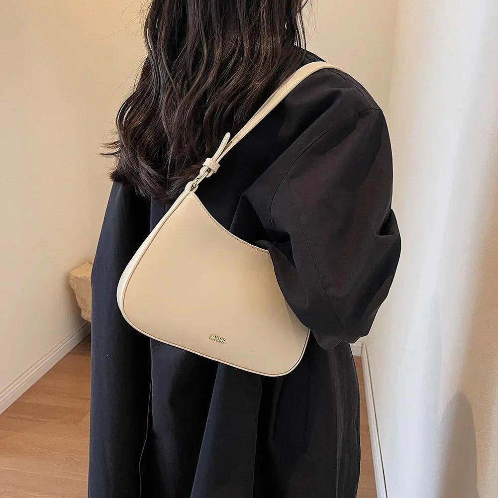 Bolso bandolera de cuero sintético con correa ajustable