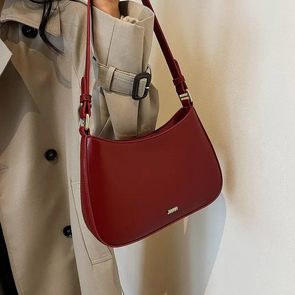 Bolso bandolera de cuero sintético con correa ajustable