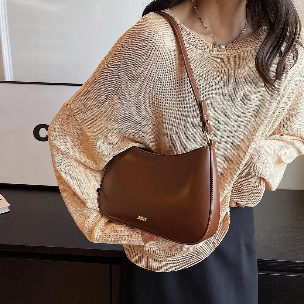 Bolso bandolera de cuero sintético con correa ajustable