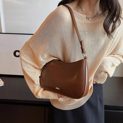 Bolso bandolera de cuero sintético con correa ajustable