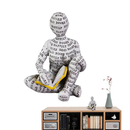 Dekorative Figur mit Lesemotiv als inspirierende und stilvolle Innendekoration