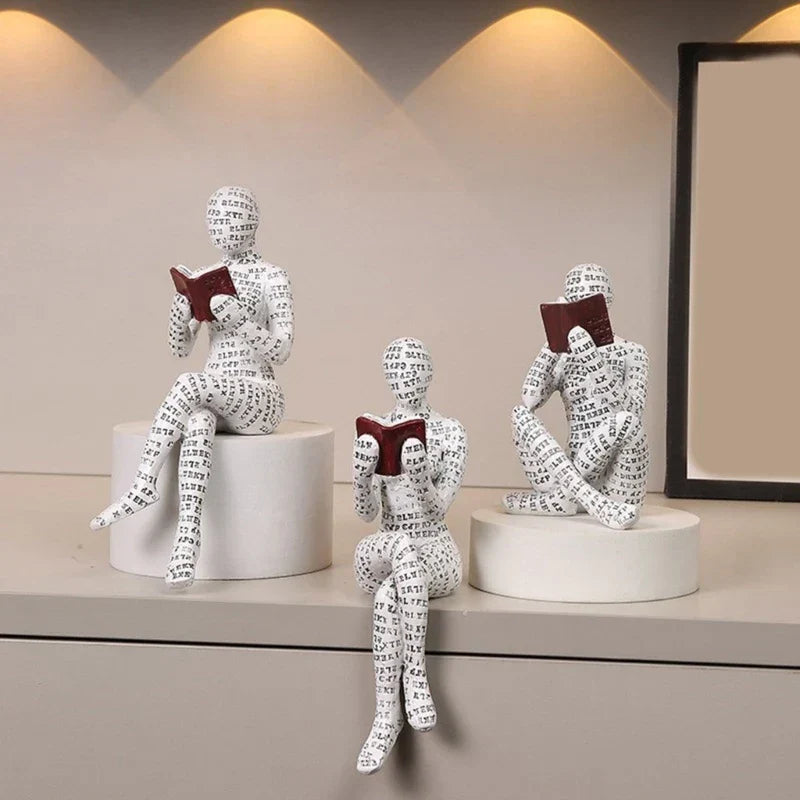 Dekorative Figur mit Lesemotiv als inspirierende und stilvolle Innendekoration