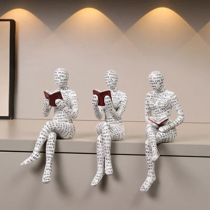 Dekorative Figur mit Lesemotiv als inspirierende und stilvolle Innendekoration