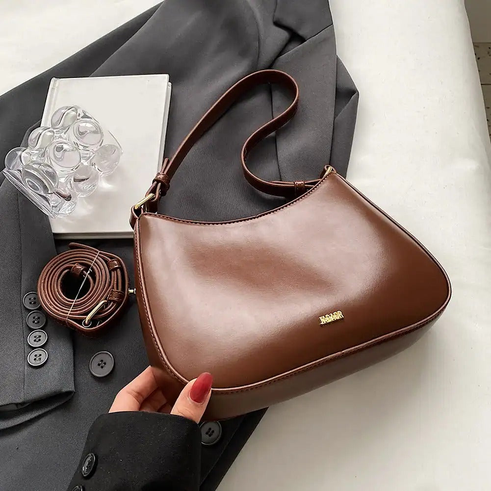 Bolso bandolera de cuero sintético con correa ajustable