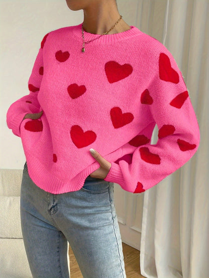 Sara | Pink jumper with red heart pattern and round neck