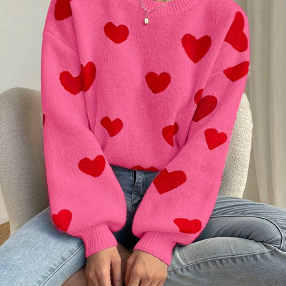 Sara | Pink jumper with red heart pattern and round neck