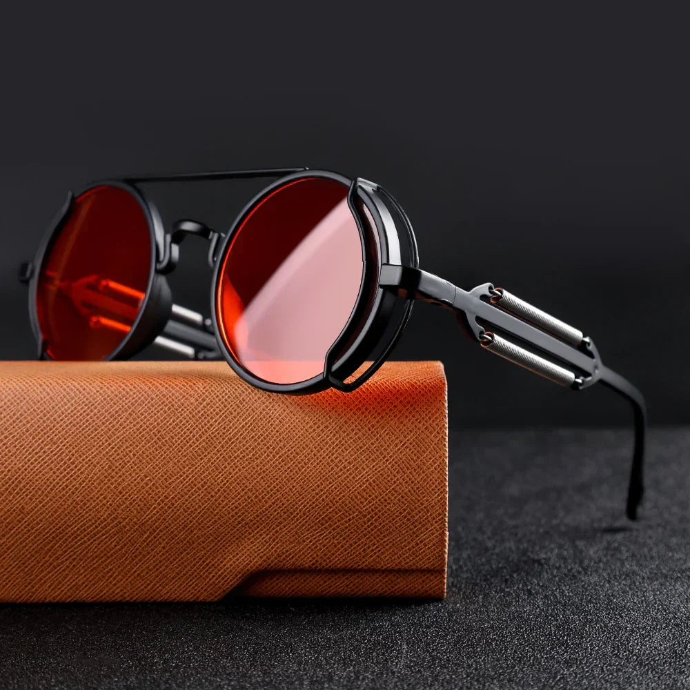 Óculos de sol redondos steampunk com lentes vermelhas e armação metálica