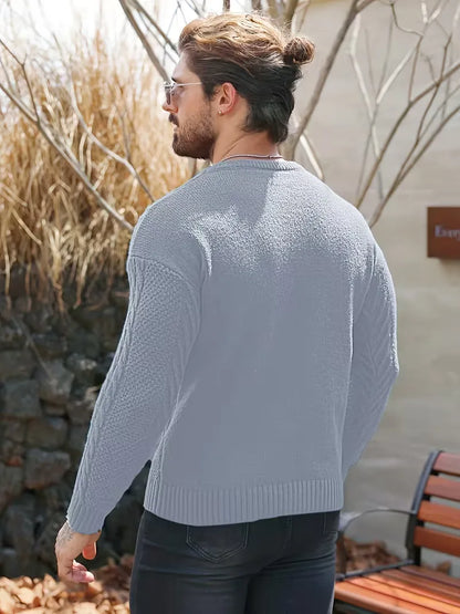 Pull ajusté à col rond avec motif torsadé