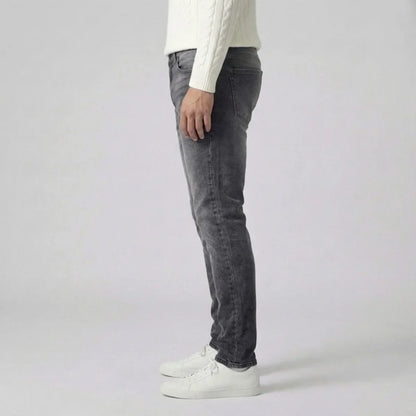 Jean slim avec délavage clair et style cinq poches