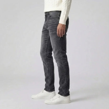 Jean slim avec délavage clair et style cinq poches