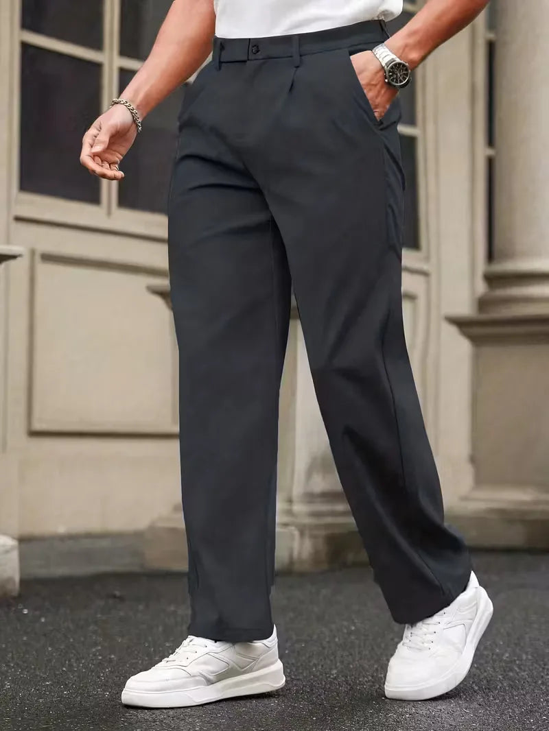 Straight trousers with pleated details and side pockets