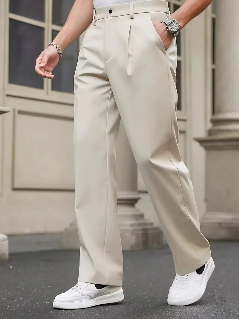 Straight trousers with pleated details and side pockets
