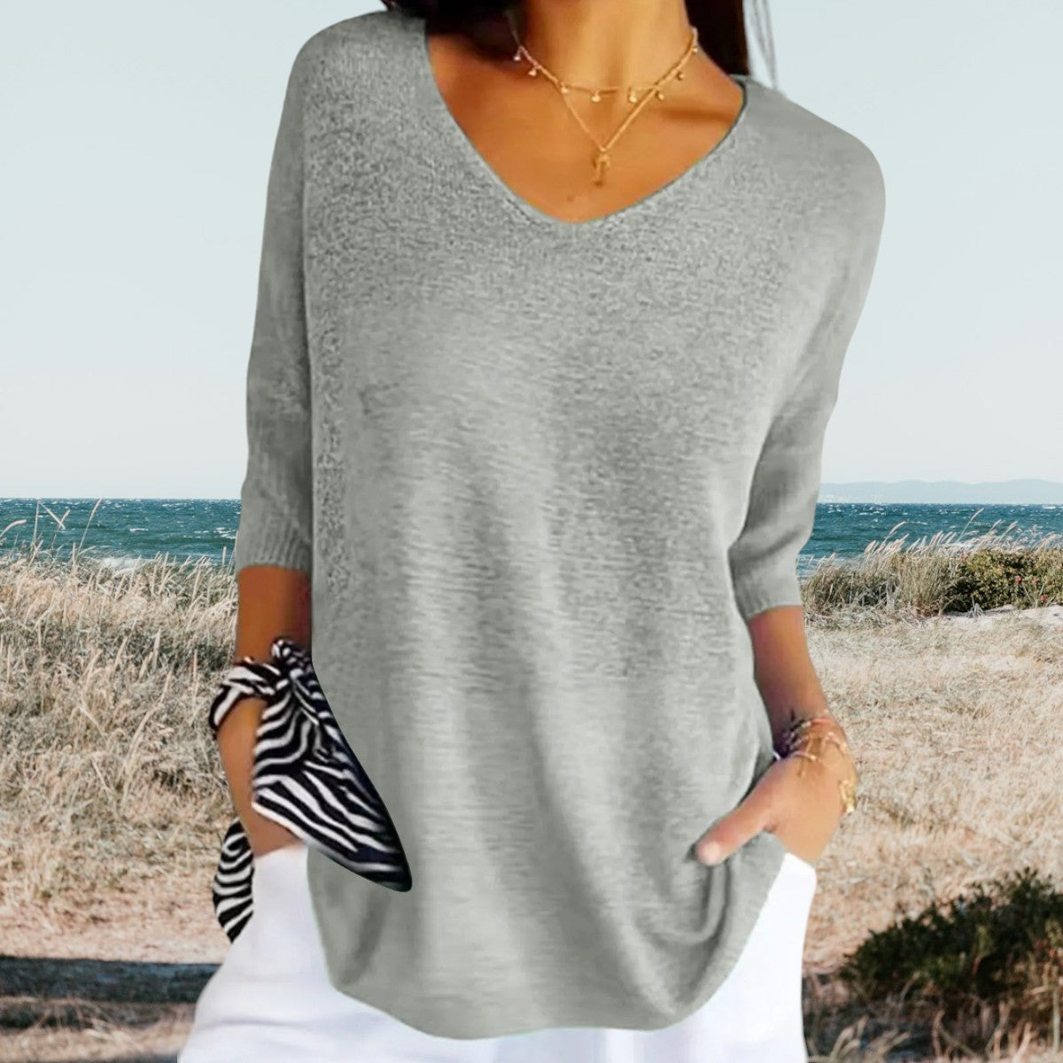 Top with V-neck and three-quarter sleeves