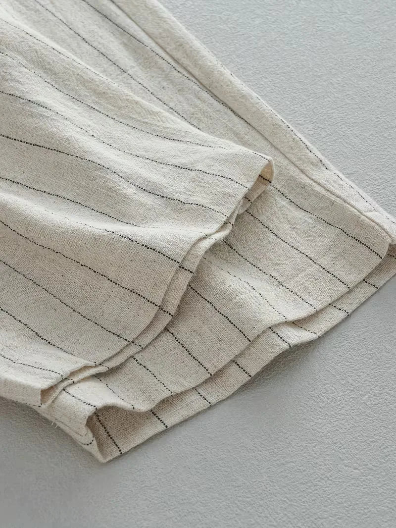 Wide fit trousers with vertical stripes
