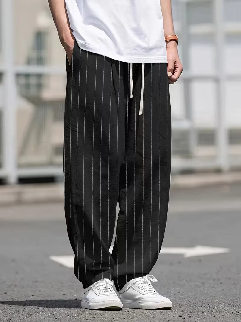 Wide fit trousers with vertical stripes