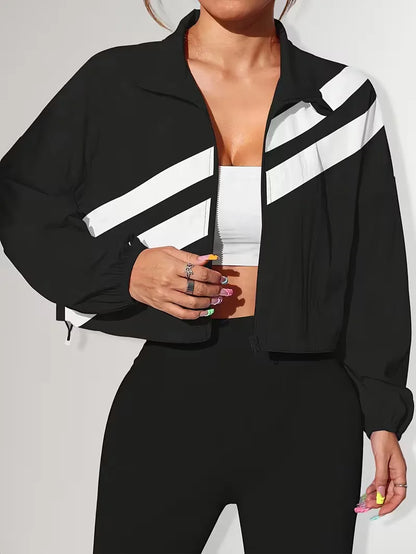 Veste de survêtement avec poignets élastiques