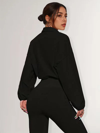 Veste de survêtement avec poignets élastiques