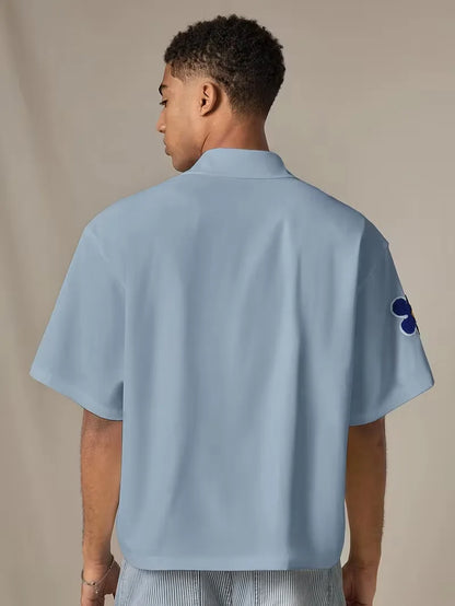 Chemise à manches courtes avec fleurs