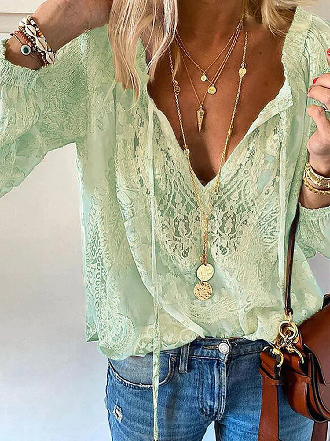 Unique Blouse with Lace Details for Women with V-Neck and Bow Closure