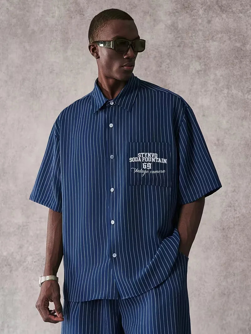 Chemise à manches courtes à rayures verticales