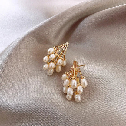 Earrings gilded with 18-carat gold.