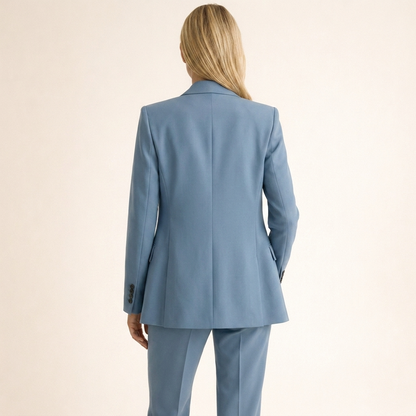 Costum clasic pentru femei, cu pantaloni evazați și rever crestat
