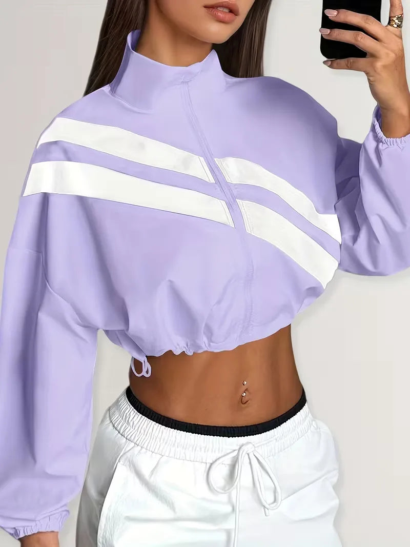 Veste de survêtement avec poignets élastiques