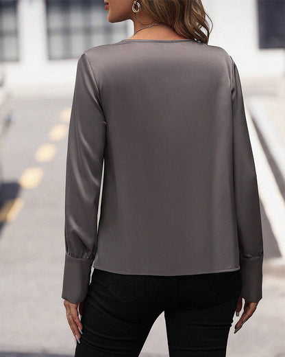 Blouse unie avec plis