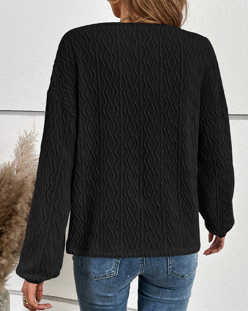 Haut uni avec boutons