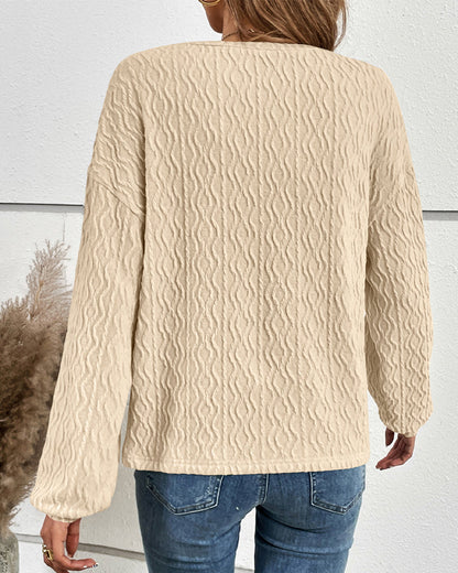 Haut uni avec boutons