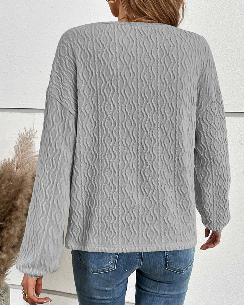 Haut uni avec boutons