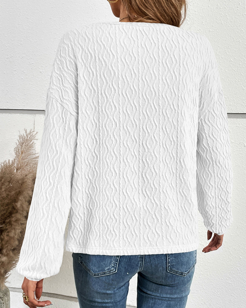 Haut uni avec boutons