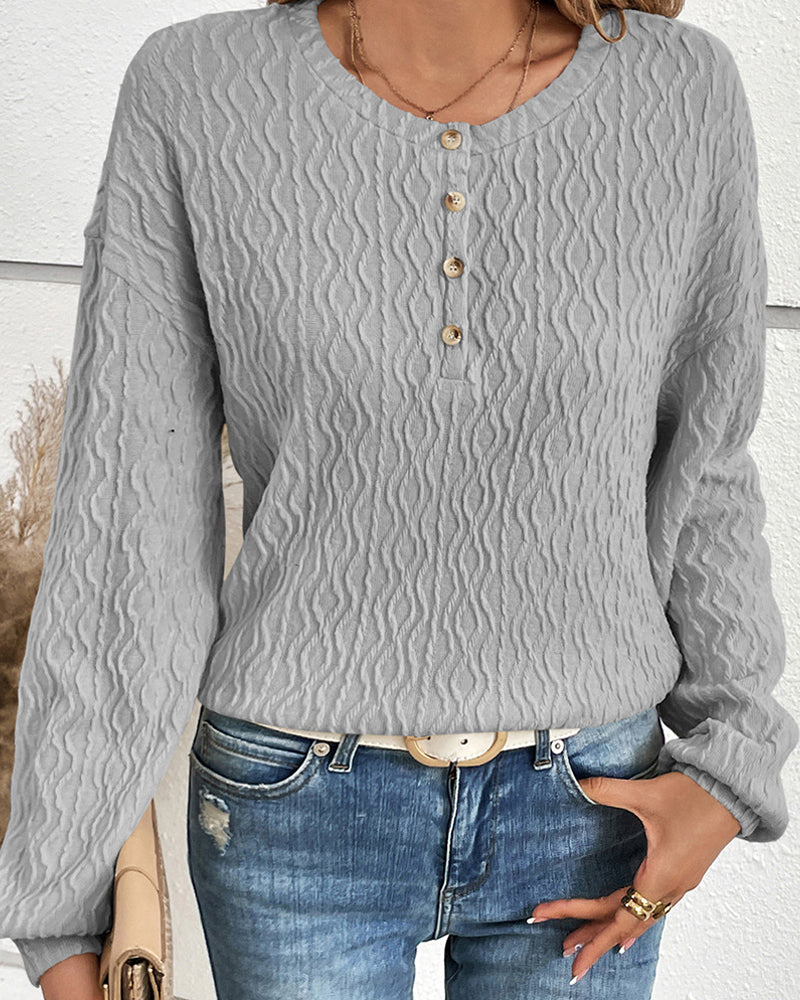 Haut uni avec boutons