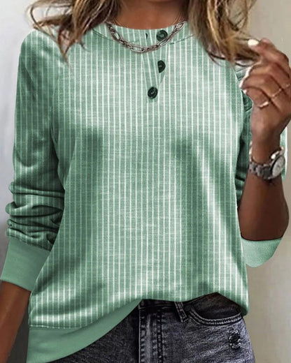 Pull rayé à col rond