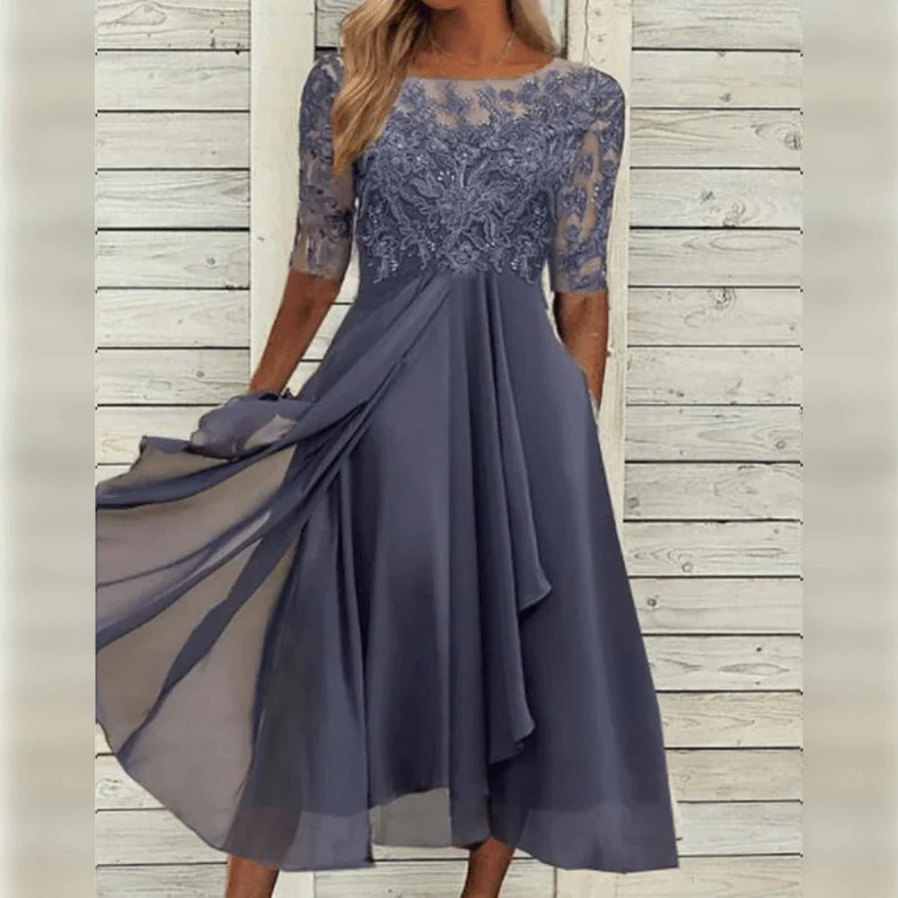 Elegant Midi Dress with Lace Detail and Flowing Skirt for Special Occasions