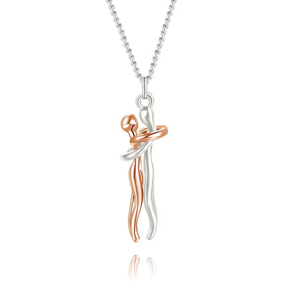 Ketting met omarmende hanger – Tijdloos symbool van liefde