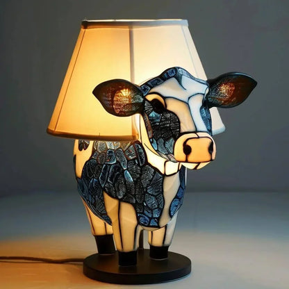 Lámpara de mesa con diseño Tiffany y forma de vaca, luz cálida y estilo artístico para un interior acogedor