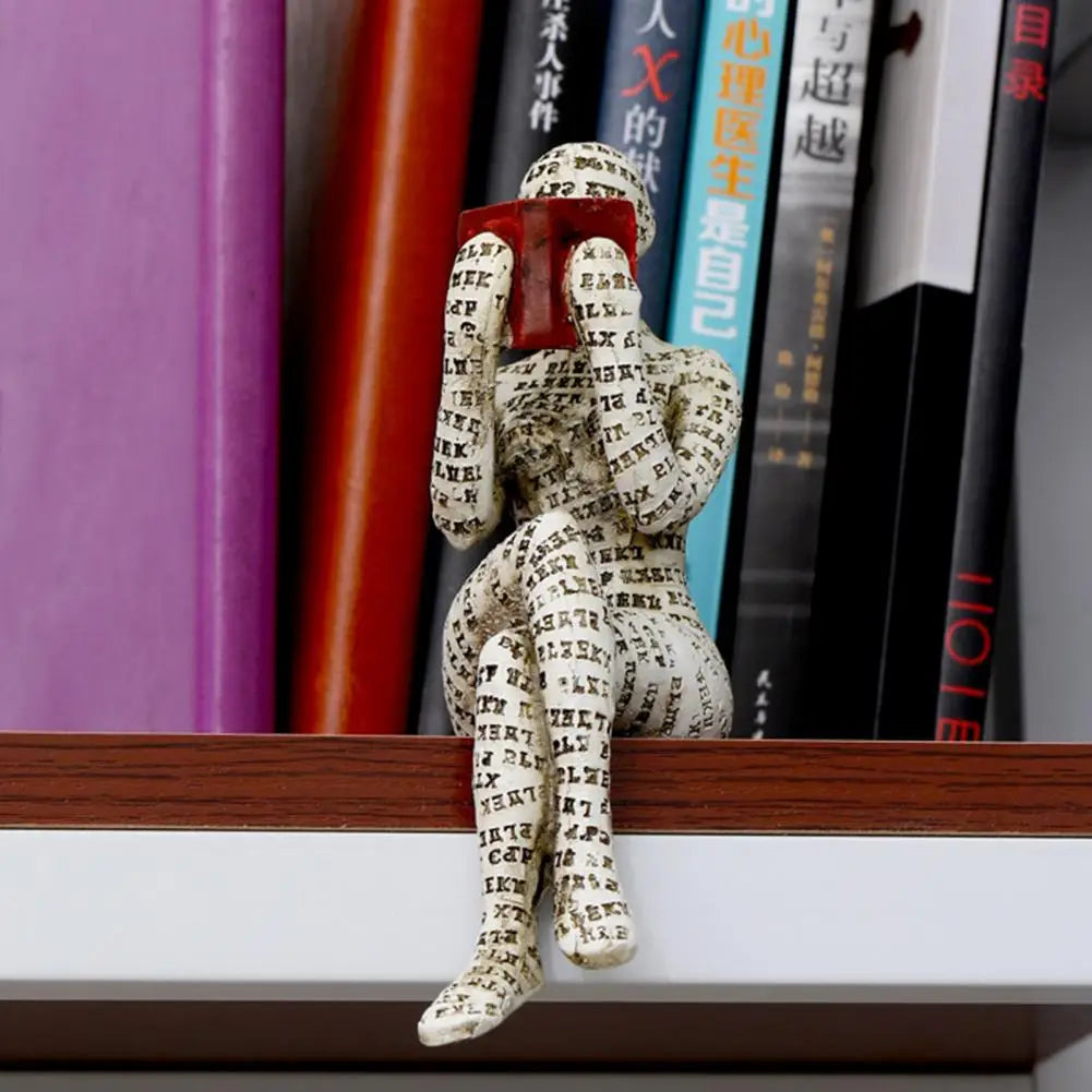Dekorative Figur mit Lesemotiv als inspirierende und stilvolle Innendekoration