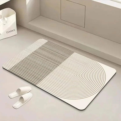 Sneldrogende badmat met antisliponderkant voor een veilige badkamer