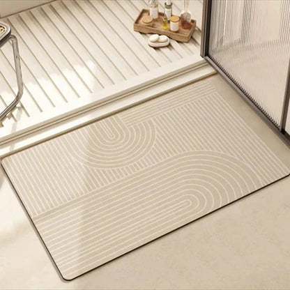 Sneldrogende badmat met antisliponderkant voor een veilige badkamer