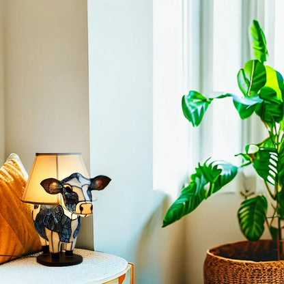 Lámpara de mesa con diseño Tiffany y forma de vaca, luz cálida y estilo artístico para un interior acogedor