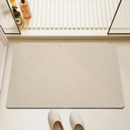 Sneldrogende badmat met antisliponderkant voor een veilige badkamer
