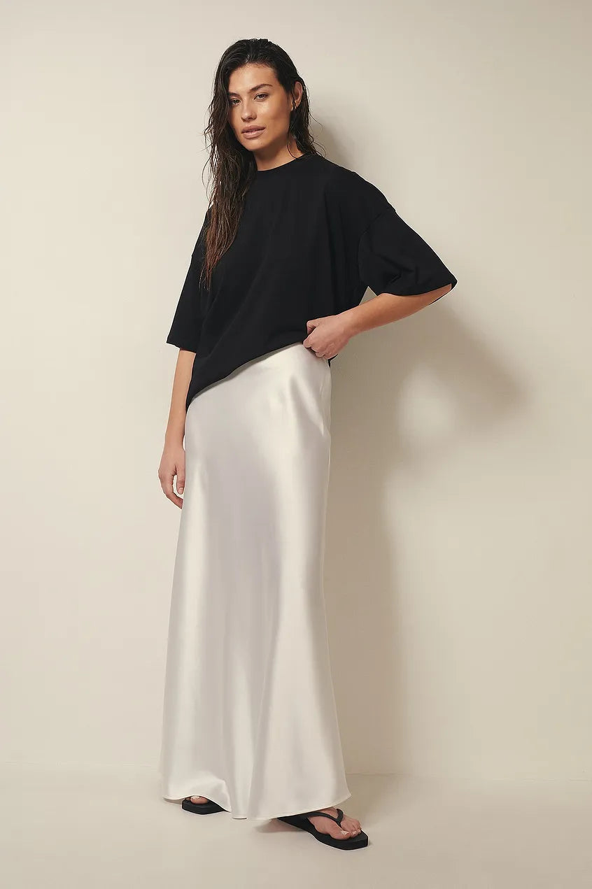 Ladies Glamorous Midi Skirt with High Waist and Shiny Fabric