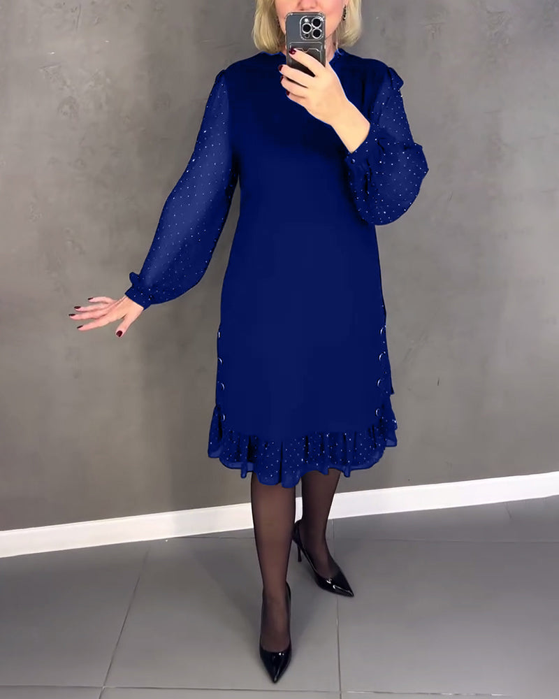 Long-sleeved elegant dress with polka dots