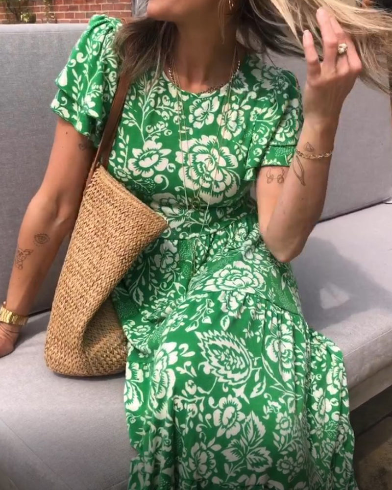 Long dress with short sleeves and a floral print