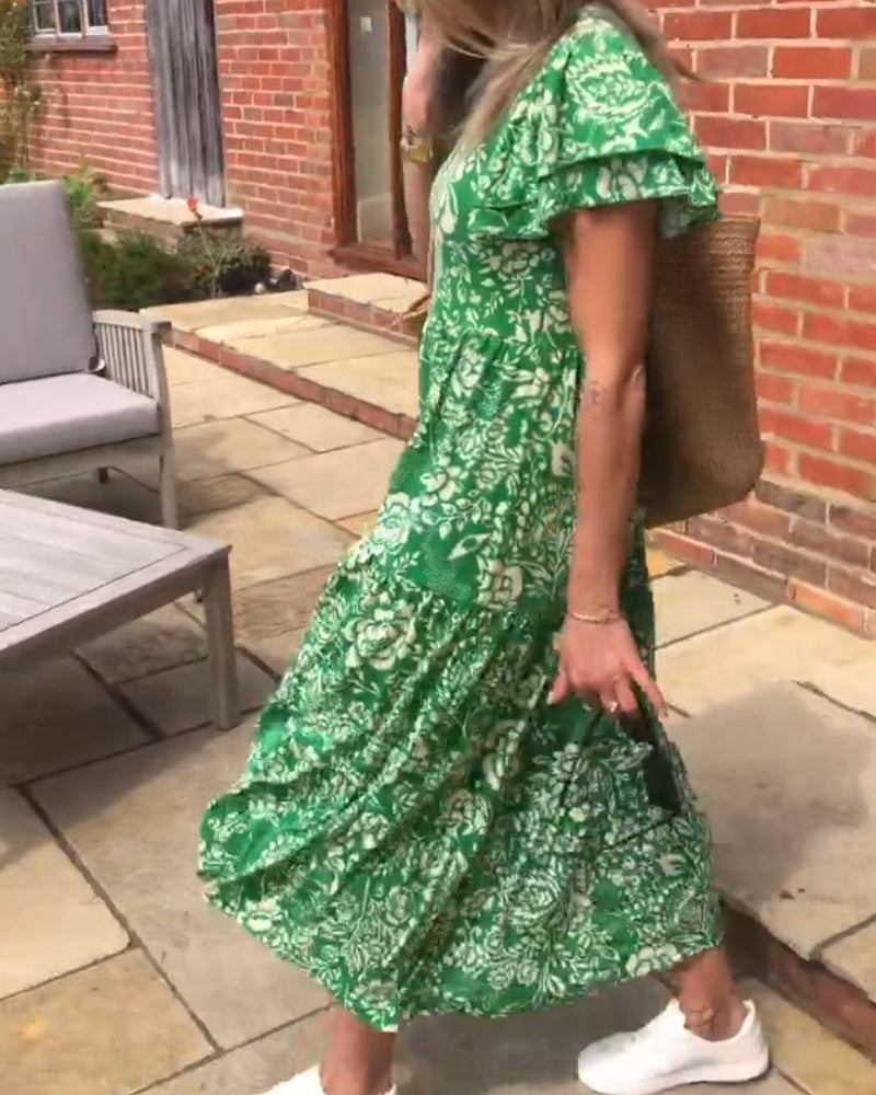 Long dress with short sleeves and a floral print
