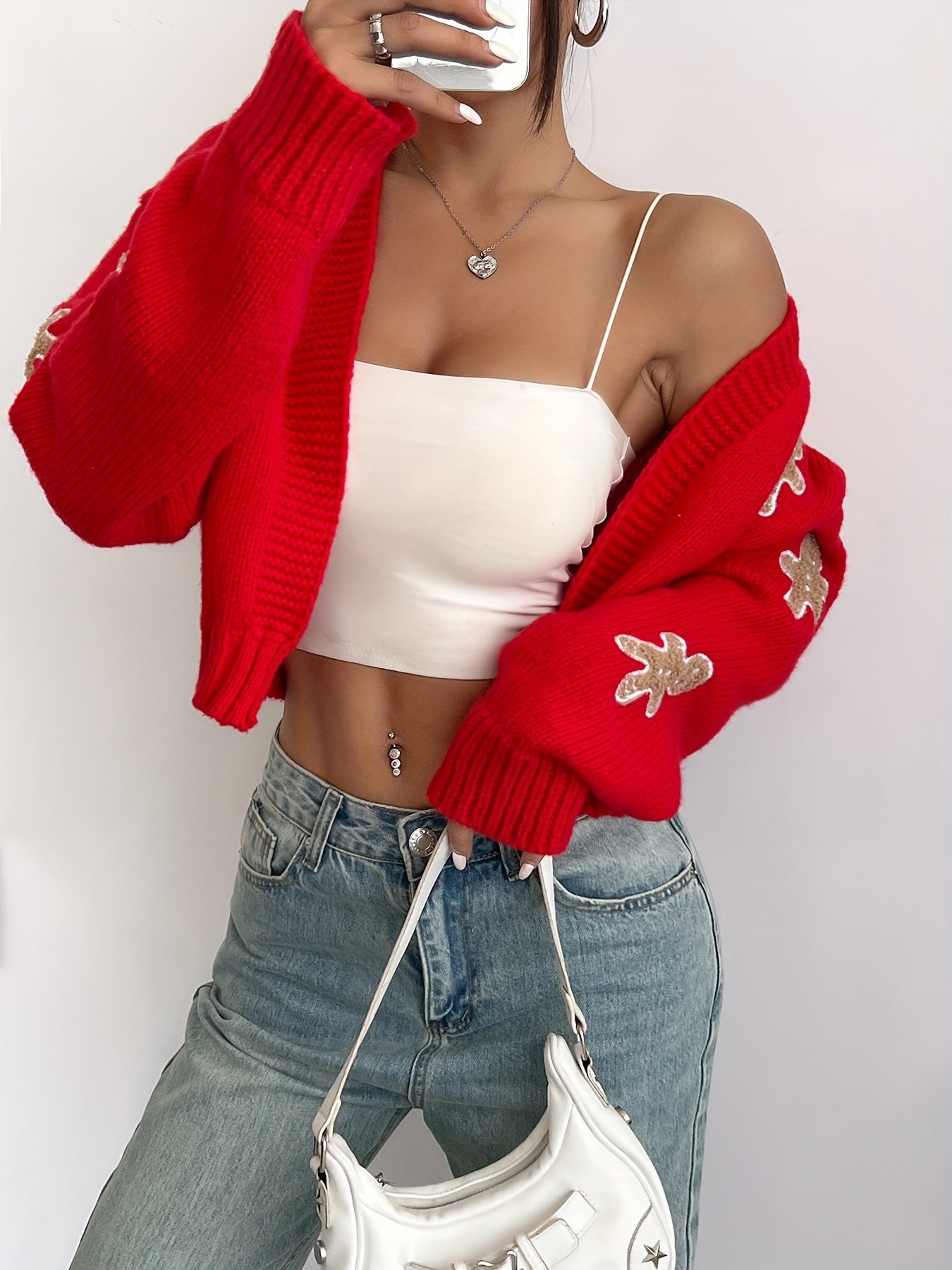 Noa | Elegant knitted cardigan with gingerbread embroidery